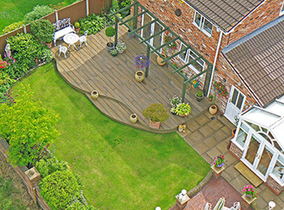AB Sundecks Decking surrounding the back of a house